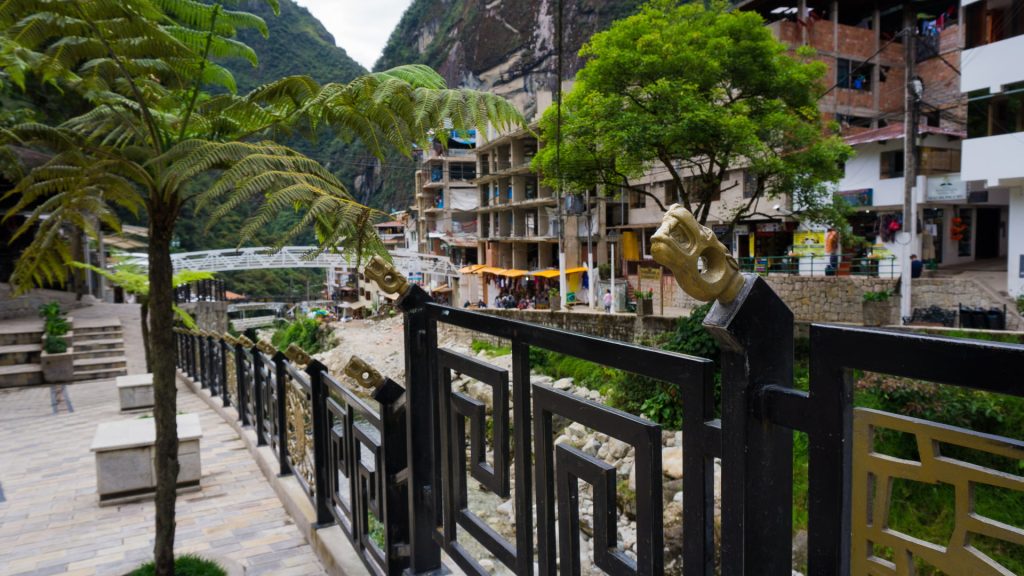 Decorative railings by the riverwalk, part of the scenic urban vibe in the Aguas Calientes Guide - Xplor Machu Picchu